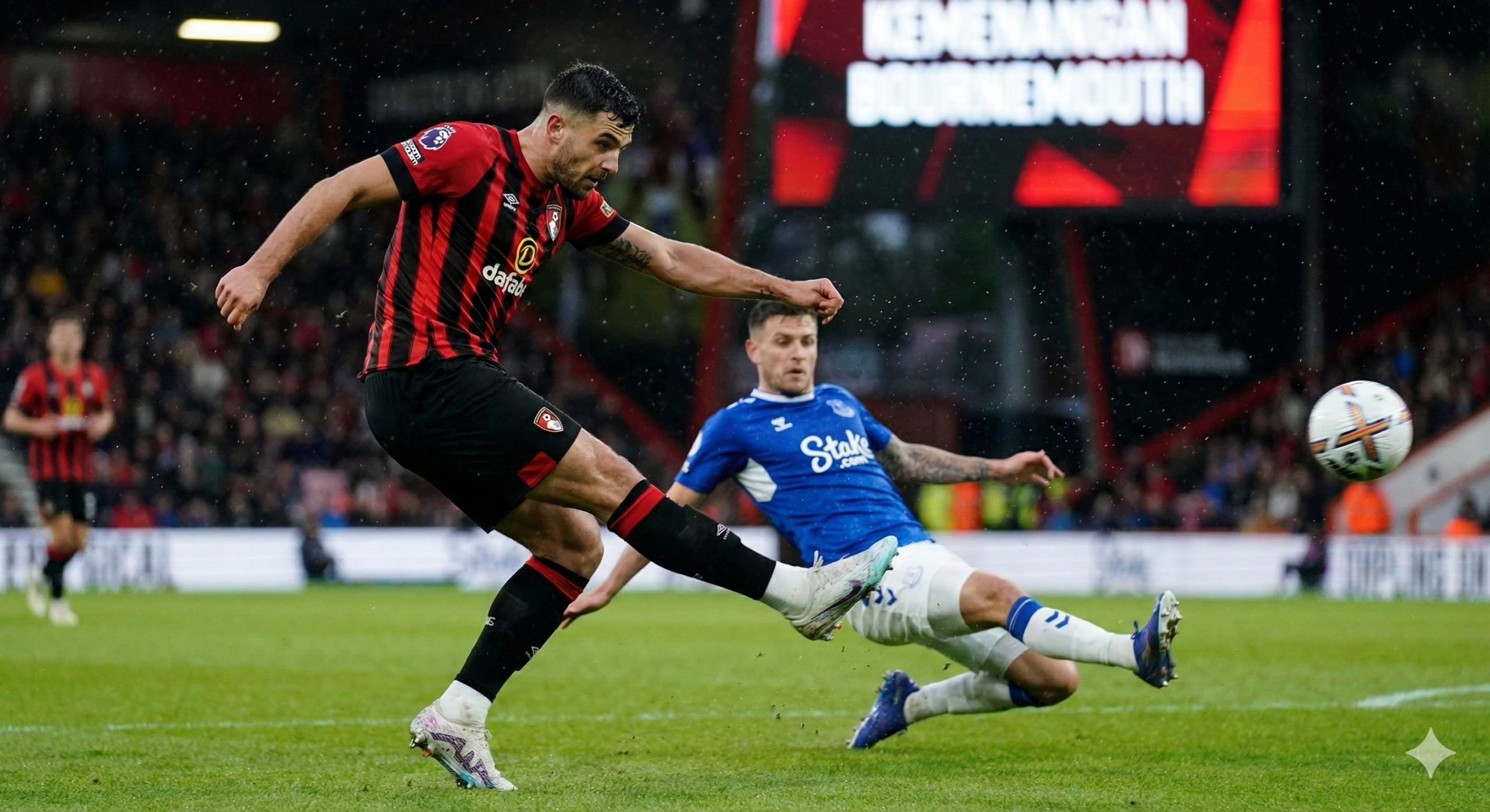A focused action shot illustrating Bournemouth's attacking potential, aligning with the prediction of over 2.5 goals. The image depicts a Bournemouth forward in the red and black home kit striking the ball powerfully towards the goal. The camera angle is low and dynamic, capturing the motion blur of the leg and the ball. Water droplets from the damp pitch are flying in the air, adding texture. In the background, an Everton defender in blue is sliding in a desperate attempt to block. The lighting is focused on the attacker, symbolizing the team's drive to return to winning ways. The style is realistic with a cinematic depth of field.