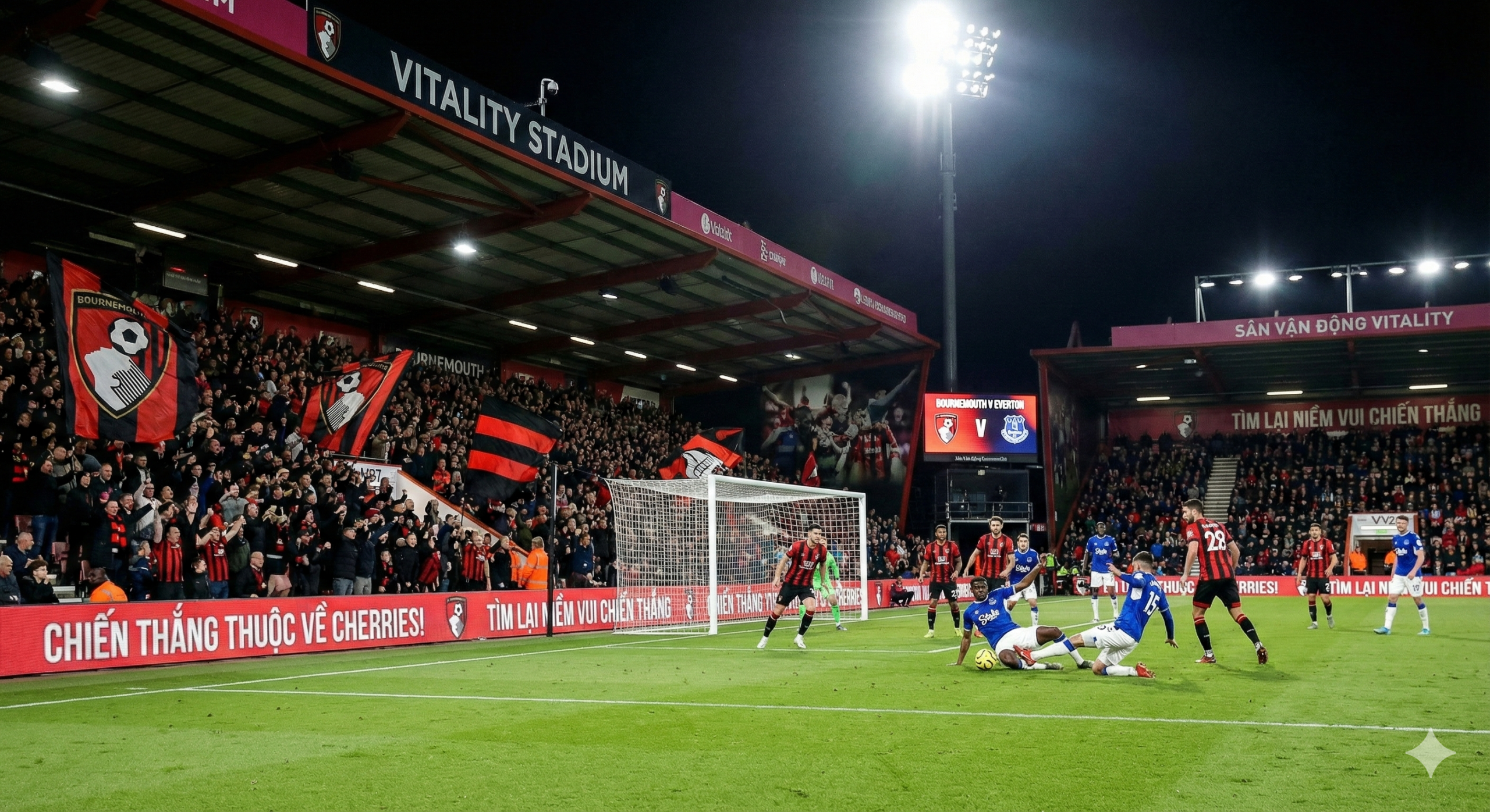 Sebuah ilustrasi visual yang dramatis menampilkan atmosfer Stadion Vitality pada malam hari menjelang pertandingan antara Bournemouth melawan Everton. Gambar ini memperlihatkan duel warna tim yang kontras, dengan sisi kiri didominasi warna merah dan hitam khas The Cherries dan sisi kanan berwarna biru royal milik The Toffees. Logo kedua klub Liga Premier Inggris ini terpampang jelas di bagian tengah dengan efek pencahayaan stadion yang megah dan sorotan lampu yang terang, mencerminkan ketegangan dan tekad kedua tim untuk bangkit dari kekalahan di pertandingan sebelumnya.